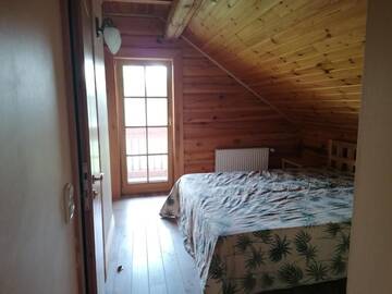 Фото номера Дом для отпуска Дома для отпуска Vacation home by the lake with sauna г. Stalbe 47
