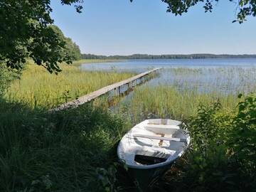 Фото номера Дом для отпуска Дома для отпуска Vacation home by the lake with sauna г. Stalbe 54
