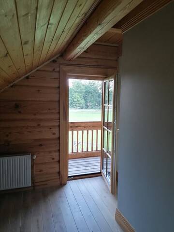 Фото номера Дом для отпуска Дома для отпуска Vacation home by the lake with sauna г. Stalbe 17