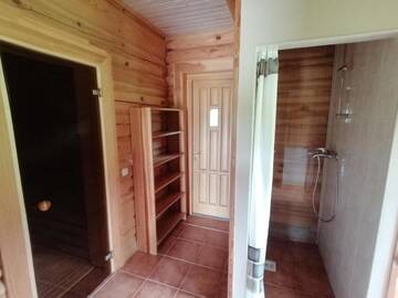 Фото номера Дом для отпуска Дома для отпуска Vacation home by the lake with sauna г. Stalbe 40